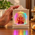 Hand Beside a Rainbow-Lit Ganesha Shrine